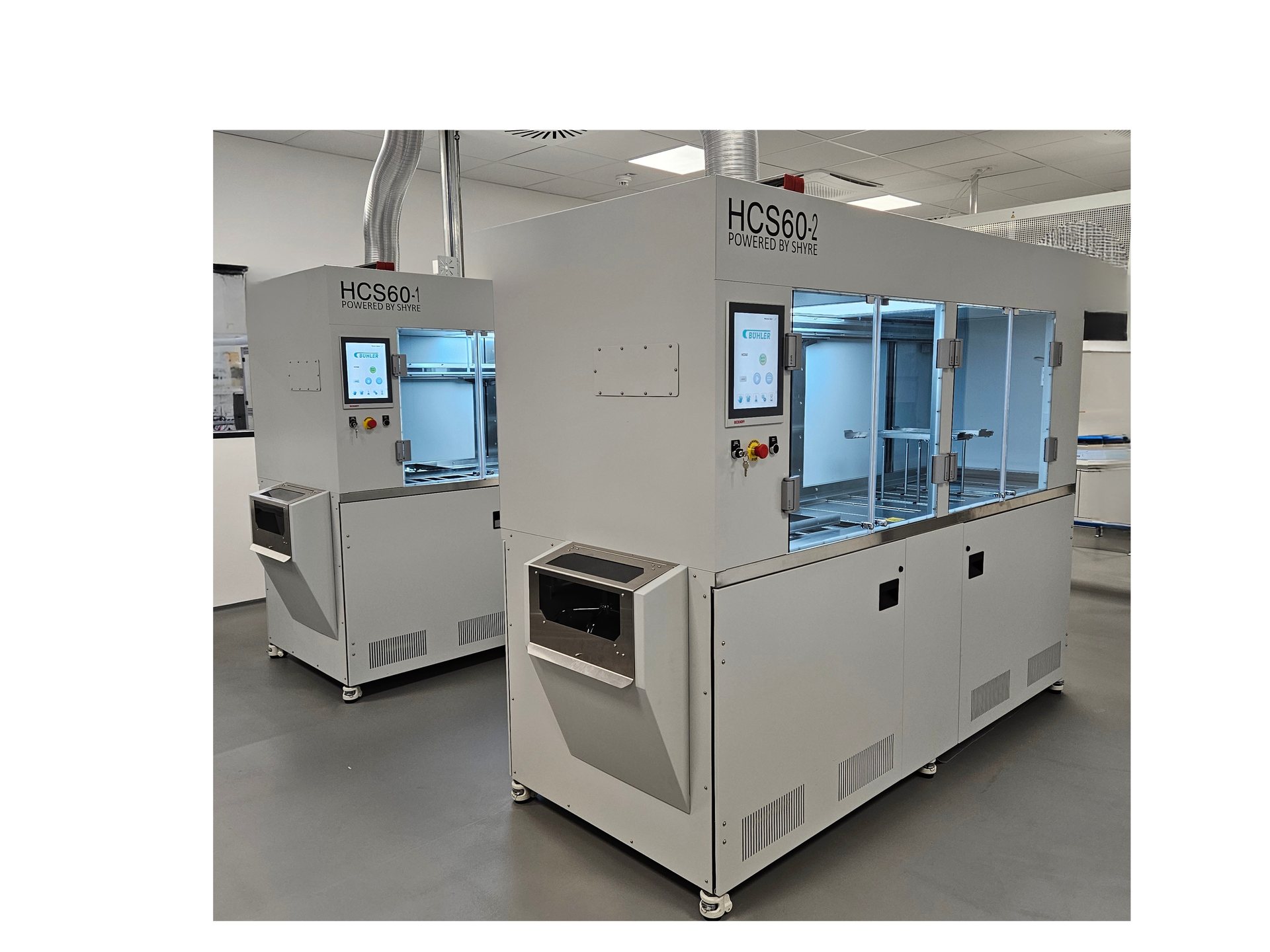Unitech Shyre HC60 dip hardcoating systems in a clean lens production room