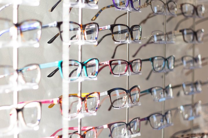Display of spectacle frames, representative of the ophthalmic and eyewear industry served by Unitech Shyre coating and cleaning systems