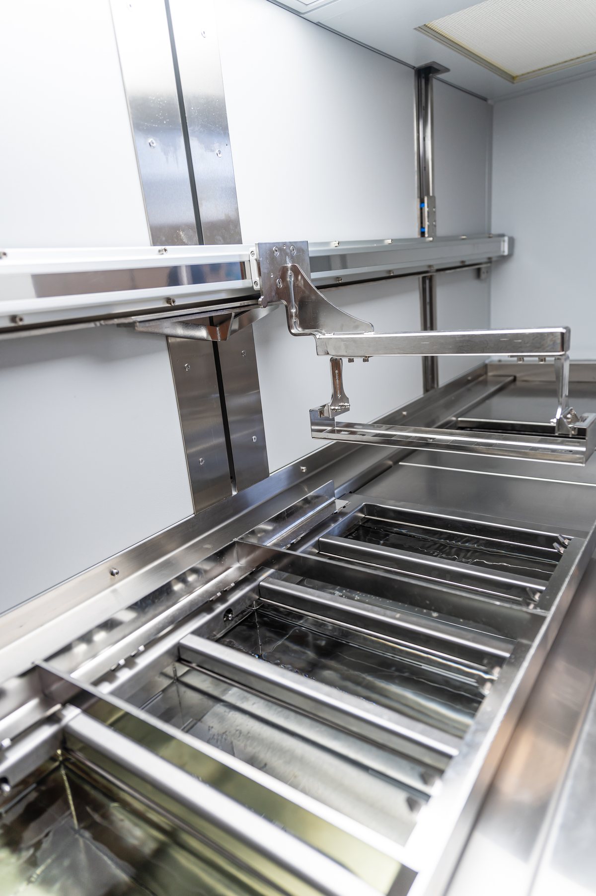 Unitech Shyre PC40 precision cleaning system interior, process tanks and transfer arm