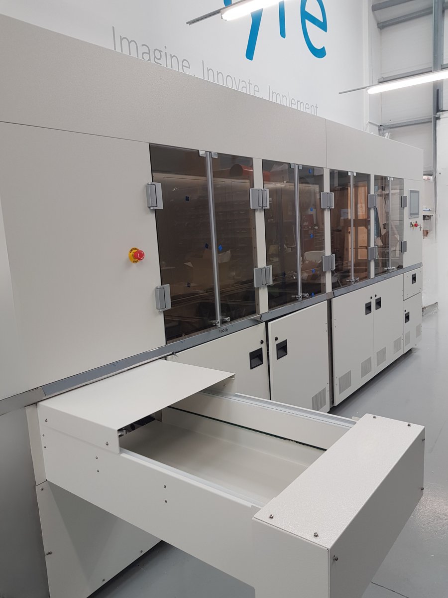 Unitech Shyre TC1000 tool cleaning line with load conveyor